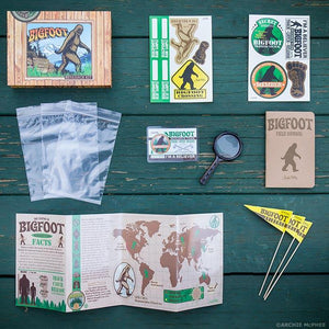Front view showing some contents of the Bigfoot Research kit including the box it comes in.