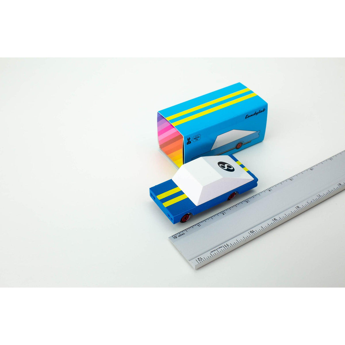 Blue racer with box and ruler