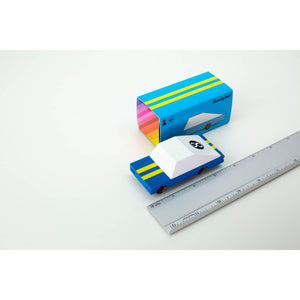 Blue racer with box and ruler