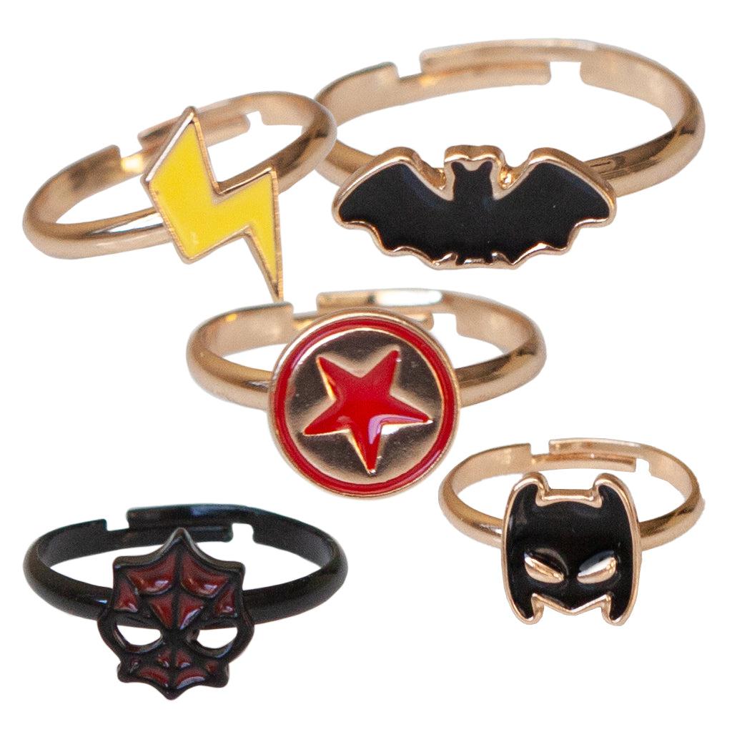 five adjustable metallic rings, each with a different inlayed super-hero symbol - yellow lightning bolt, black bat, red shield, black Batman helmet, red Spiderman mask. 