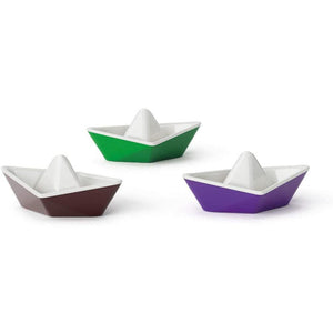 Front view of three Origami Color Changing boats in brown, green, and purple.