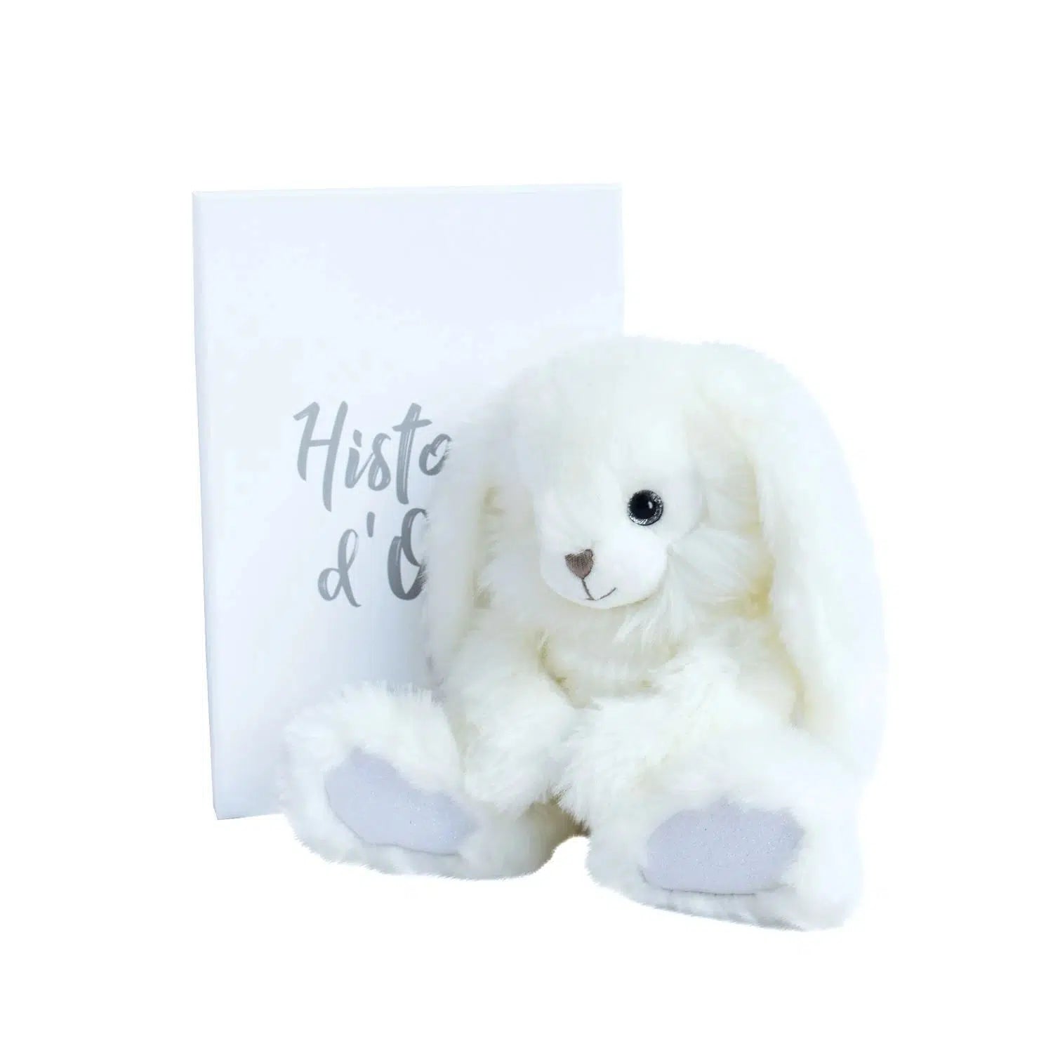 Front view of white dapper rabbit with box.