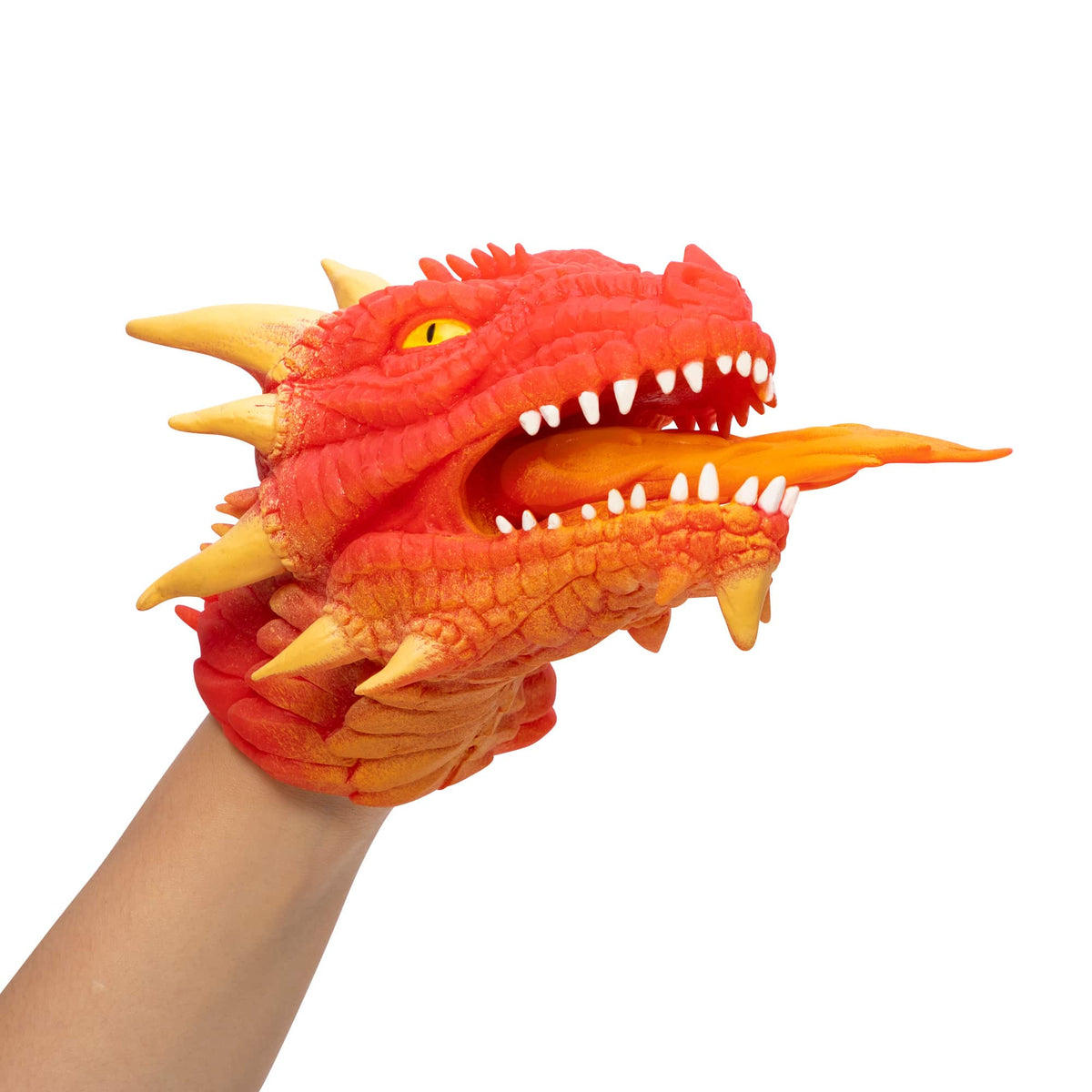 Side view of a red dragon hand puppet on a hand. 