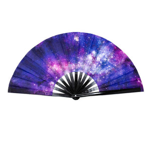A purple galaxy print is on the front of the foldable fan, which has black sticks