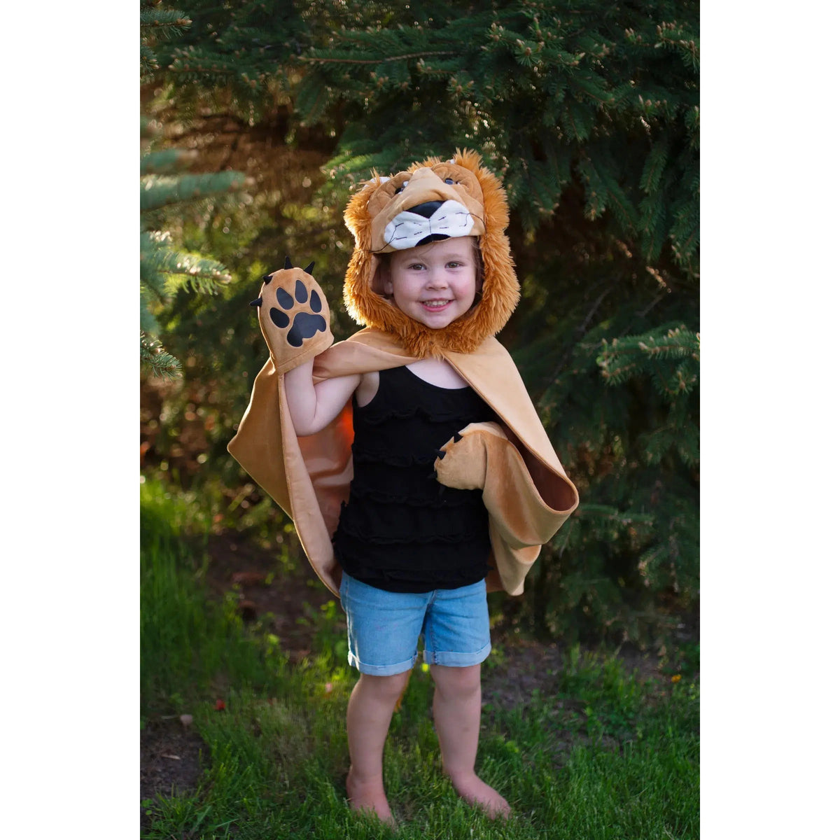 Front view of a child wearing the lion cape.
