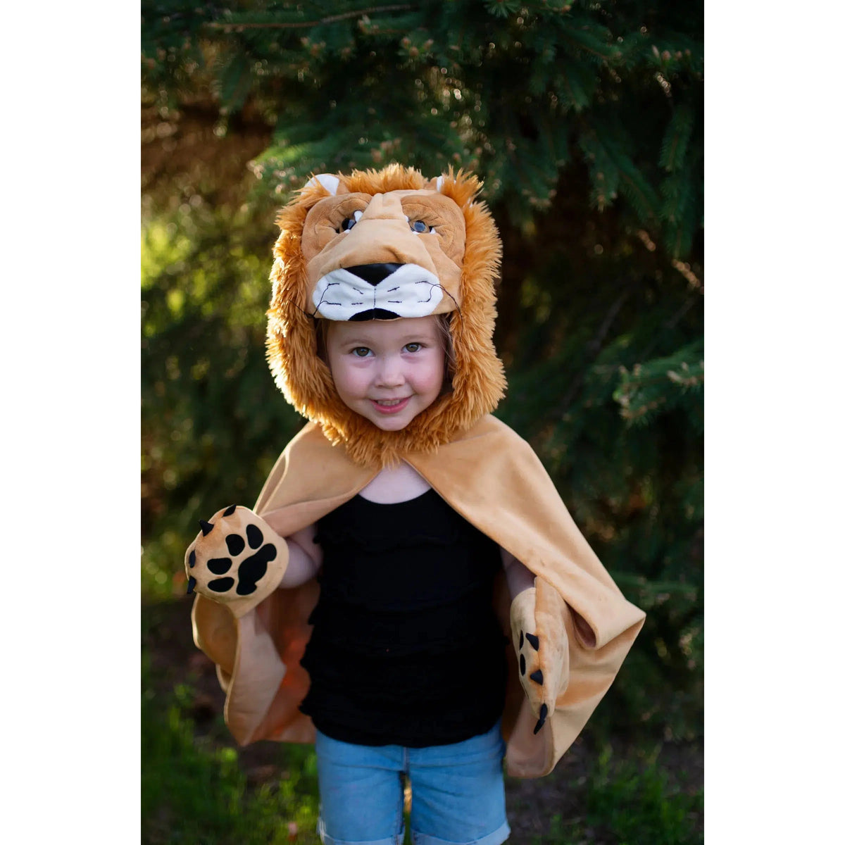 Front view of a child wearing the lion cape. 