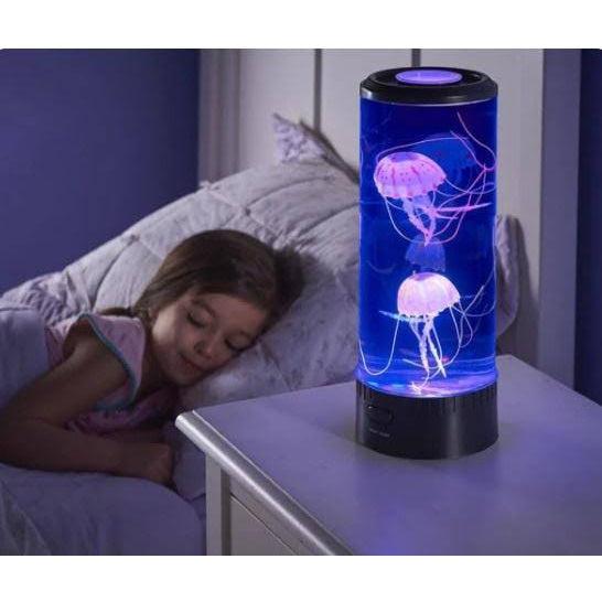 Side view of the jellyfish lamp sitting on a bedside table, with a child sleeping in the background.