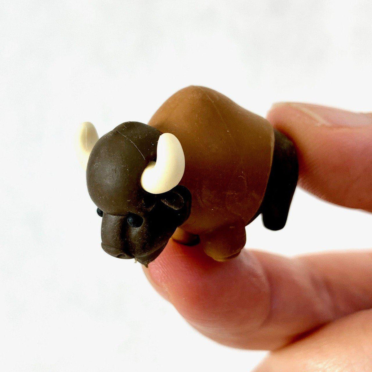 Front view of the bison being held in someone&#39;s hand from the Puzzle Eraser-Safari set.