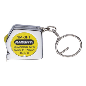 Side view of the keychain tape measure retracted.