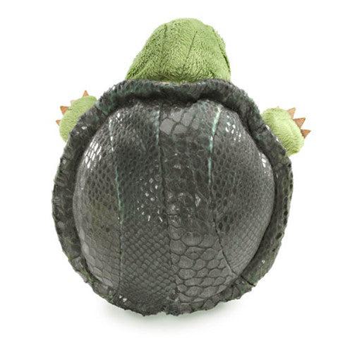 Little turtle stage puppet from behind