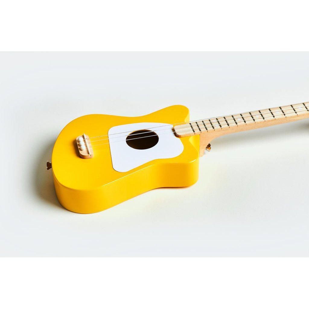 Side view of the mini yellow guitar.