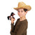 Brown and white paint pony finger puppet held by a boy with a farmer hat