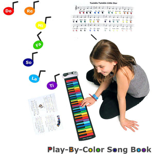 Front view of child playing along to a song in the play-by-color song book. 