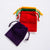 Front view of the bags in a variety of colors including purple, red, green, and yellow from the Fill-A-Pouch-Treasure Bag.