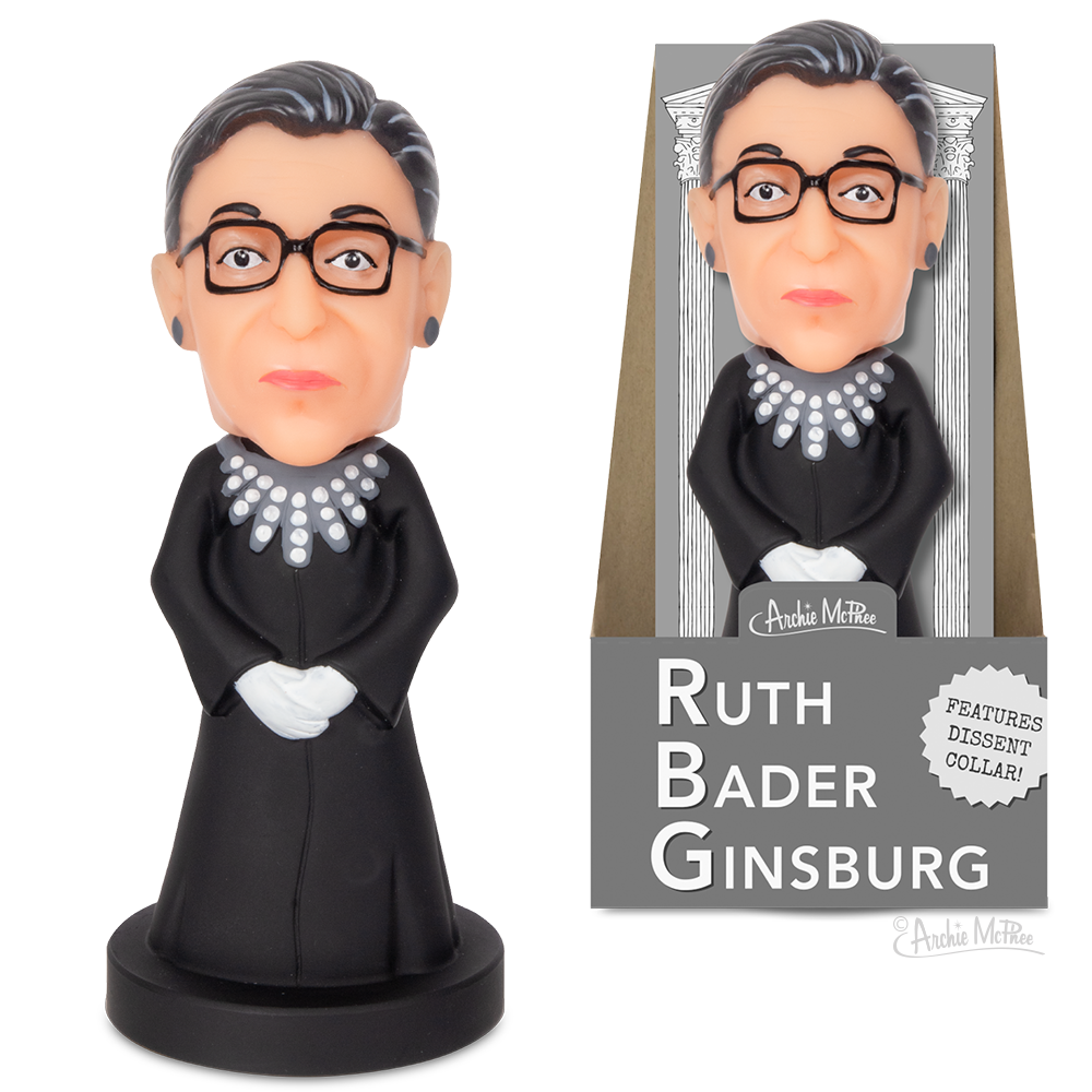 Front view of Ruth Bader Gingburgh bobble standing beside one in packaging.