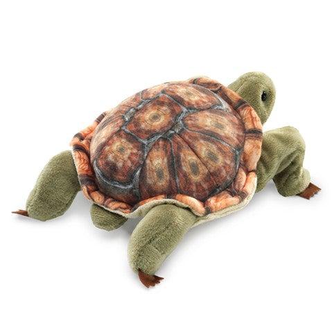 Tortoise finger puppet shown from quarter rear view.