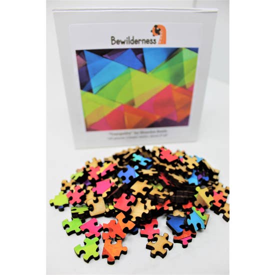 Box with wooden puzzle pieces