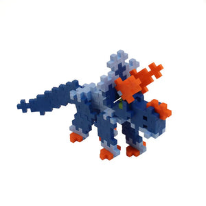Triceratops made from navy, light blue, and orange plus plus pieces